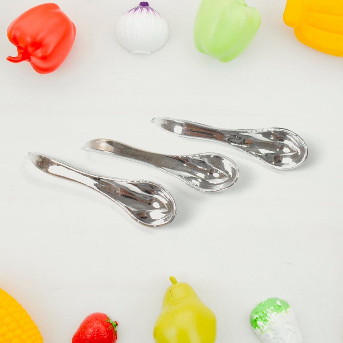 Colourful miniature plastic tea cups and a small serving tray for kids.