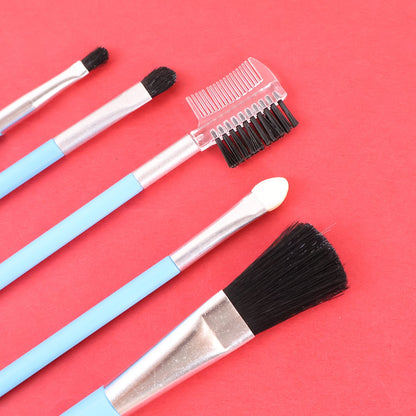 Detailed view of the angled liner and blush brushes from the makeup set for precise application.