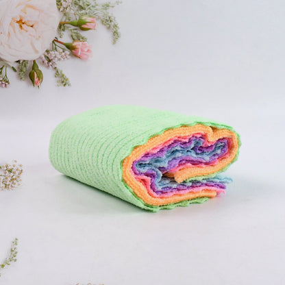 Microfiber cloth absorbing water to demonstrate high absorbency
