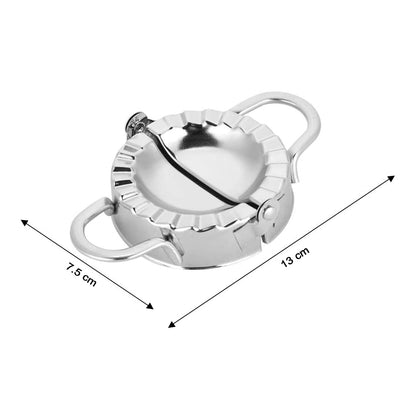 Side view of the versatile stainless steel pie mold tool.