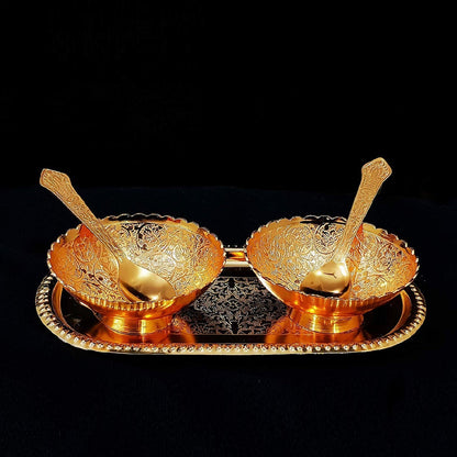 Detailed view of the elegant brass serving set, showcasing its intricate gold and silver plating.