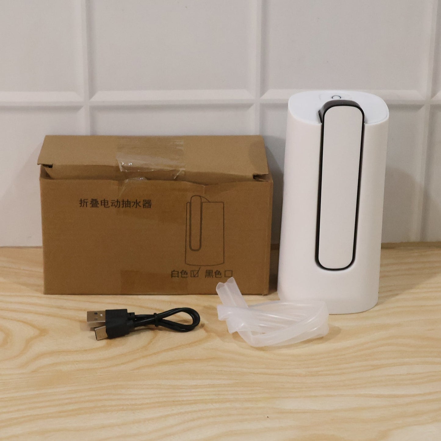 Folded electric water dispenser pump in kitchen