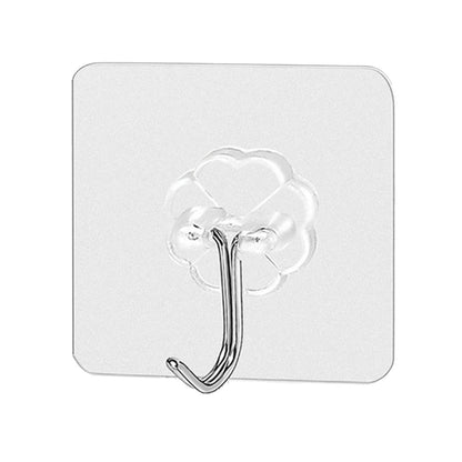 Lifestyle image showing 100 stainless steel adhesive hooks neatly arranged for home organization.