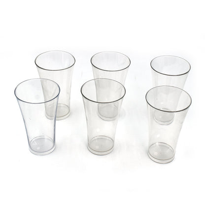 Transparent plastic drinking glasses filled with refreshing beverages.
