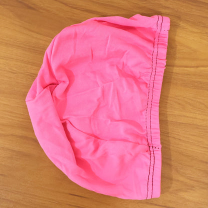 Stylish pink swim head cap, waterproof and snug-fitting